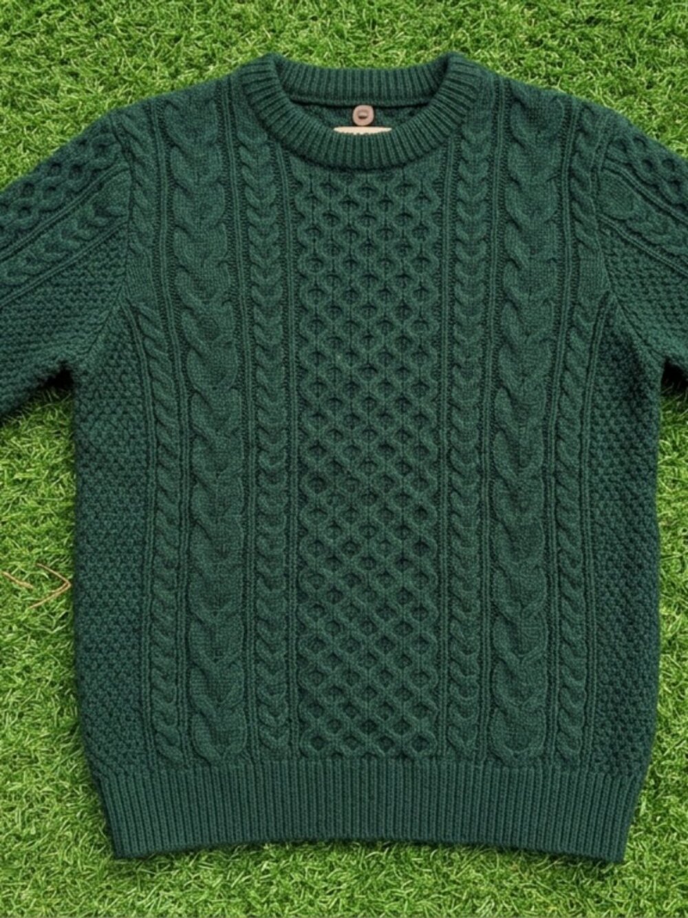 green ribbed sweater